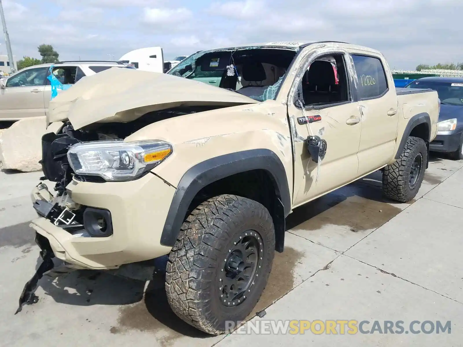 2 Photograph of a damaged car 3TMCZ5AN5LM315291 TOYOTA TACOMA 2020