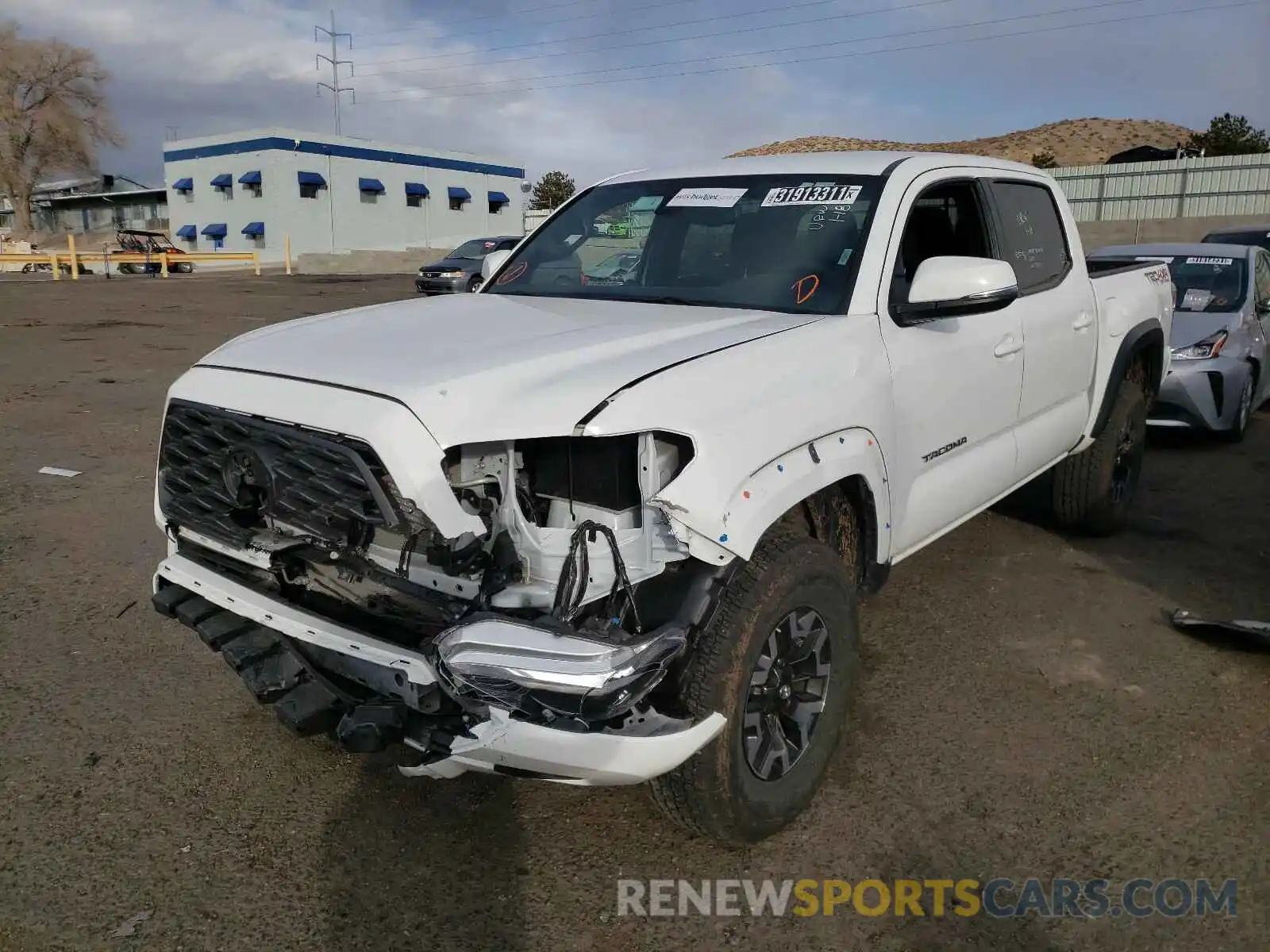 2 Photograph of a damaged car 3TMCZ5AN5LM333936 TOYOTA TACOMA 2020