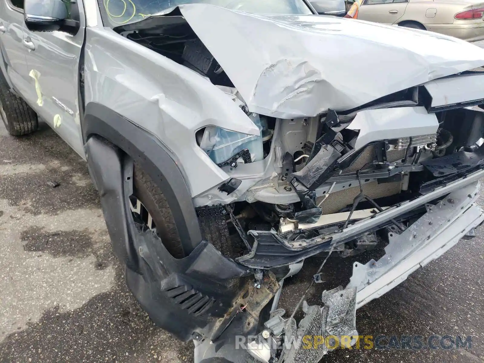 9 Photograph of a damaged car 3TMCZ5AN6LM310634 TOYOTA TACOMA 2020