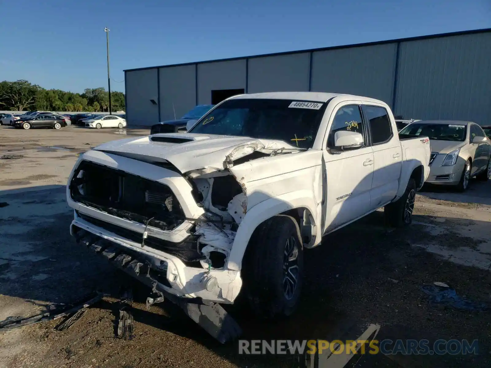 2 Photograph of a damaged car 3TMCZ5AN6LM311363 TOYOTA TACOMA 2020