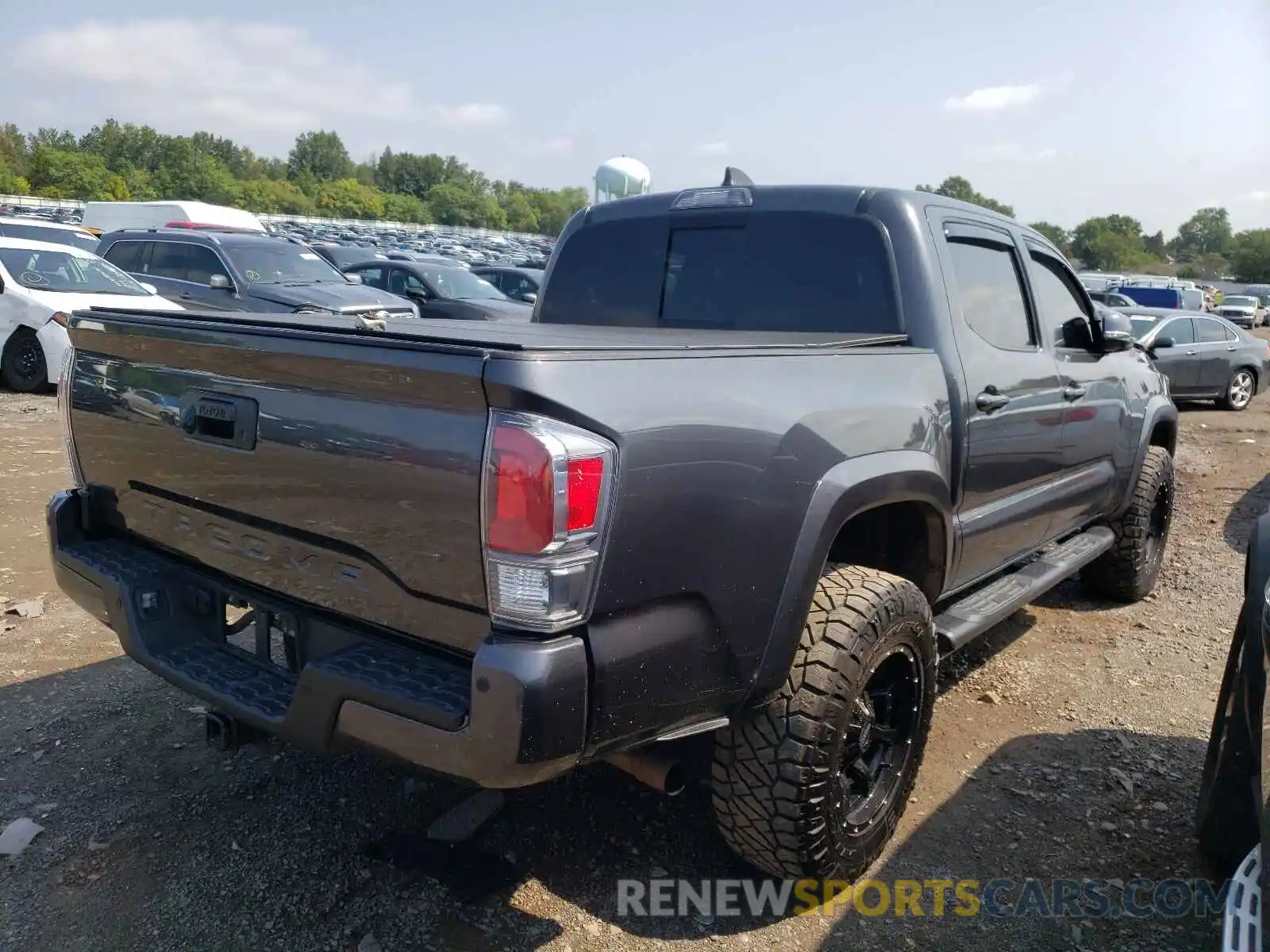 4 Photograph of a damaged car 3TMCZ5AN6LM313629 TOYOTA TACOMA 2020