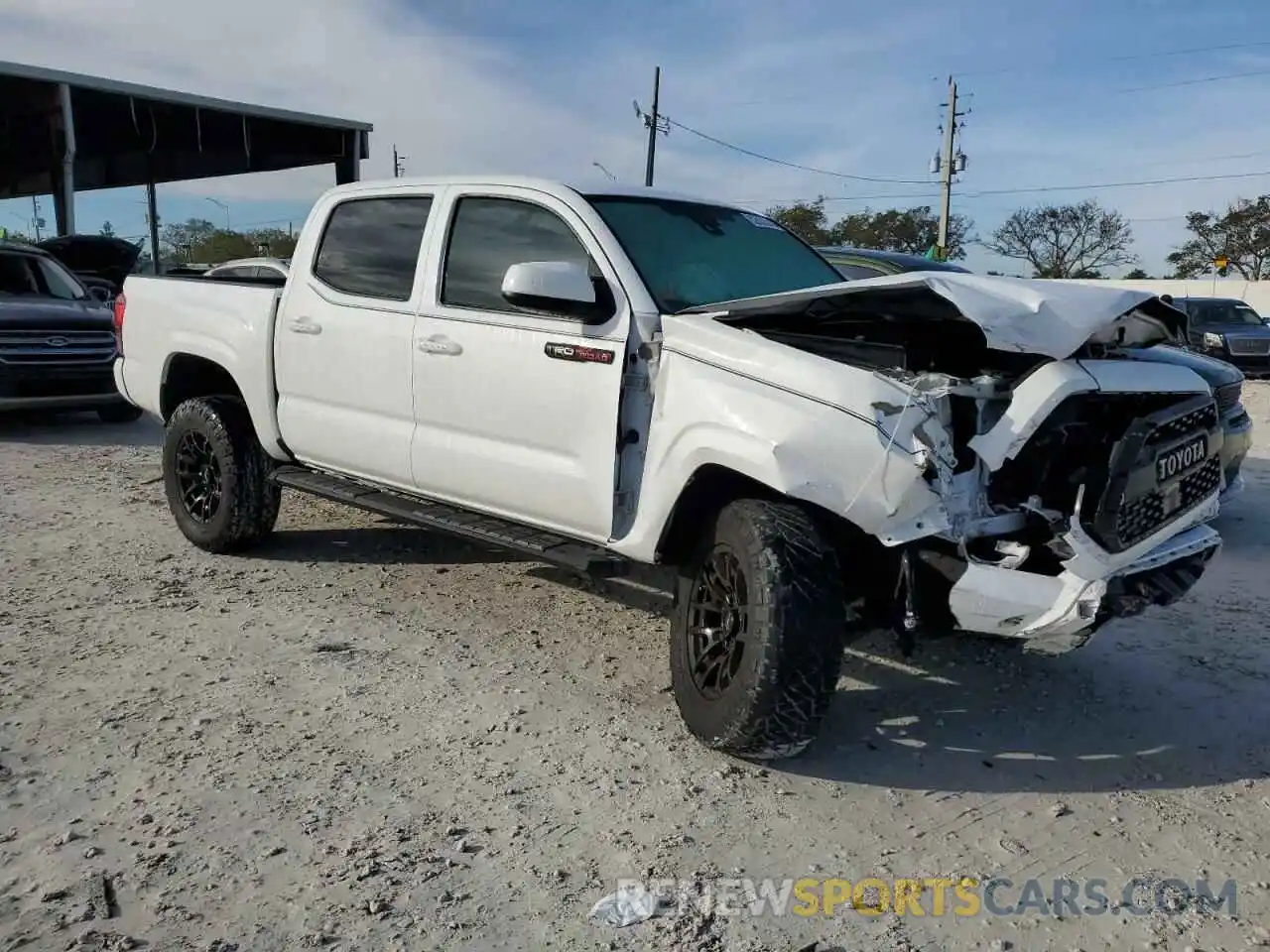 4 Photograph of a damaged car 3TMCZ5AN6LM320452 TOYOTA TACOMA 2020