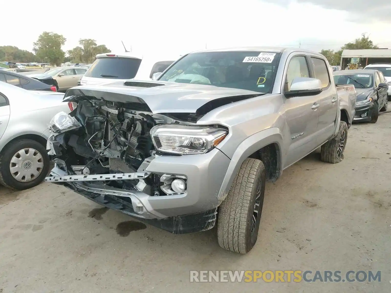 2 Photograph of a damaged car 3TMCZ5AN6LM323366 TOYOTA TACOMA 2020