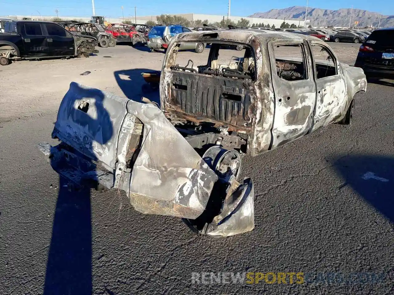 4 Photograph of a damaged car 3TMCZ5AN7LM322002 TOYOTA TACOMA 2020