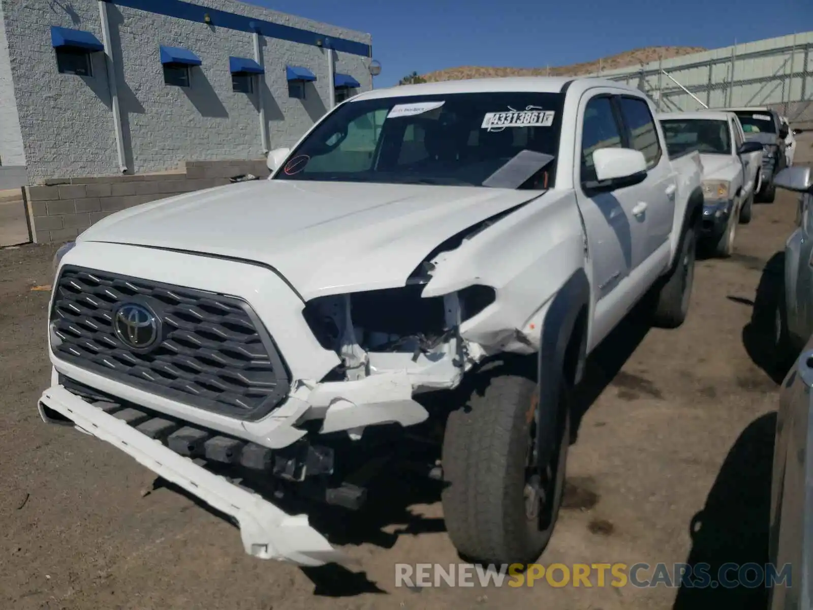 2 Photograph of a damaged car 3TMCZ5AN7LM329449 TOYOTA TACOMA 2020