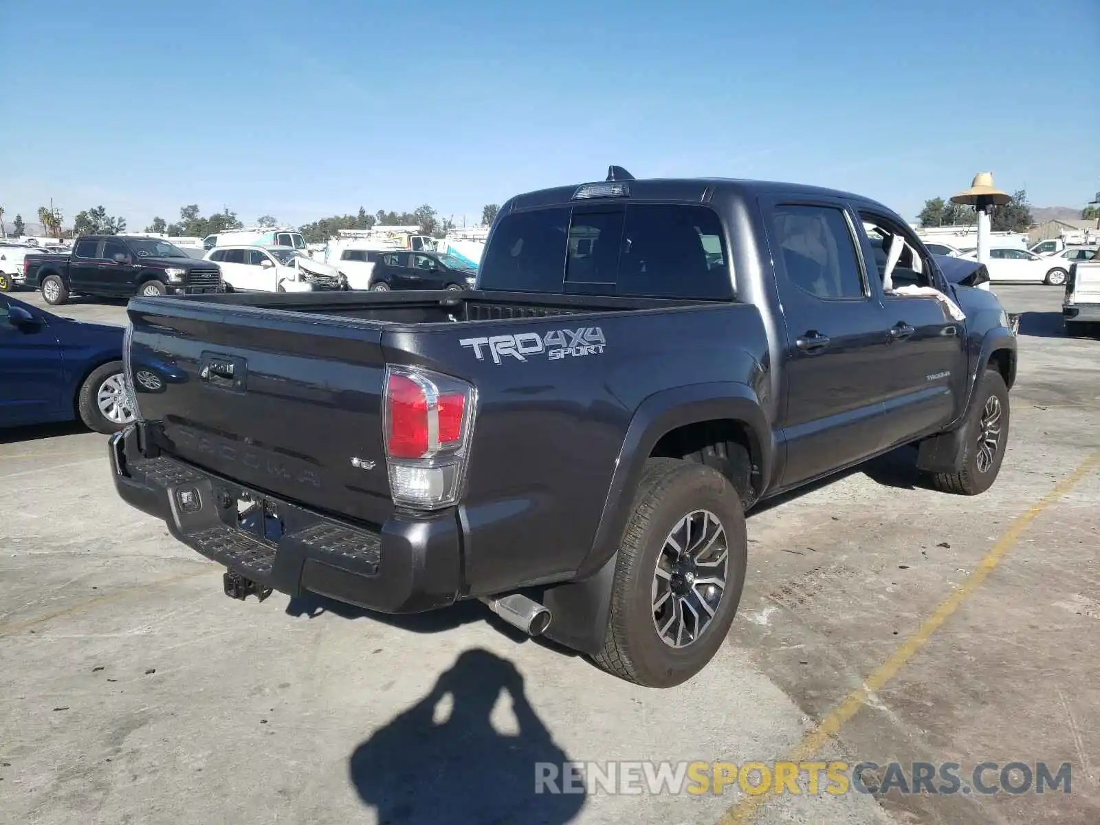 4 Photograph of a damaged car 3TMCZ5AN7LM351077 TOYOTA TACOMA 2020