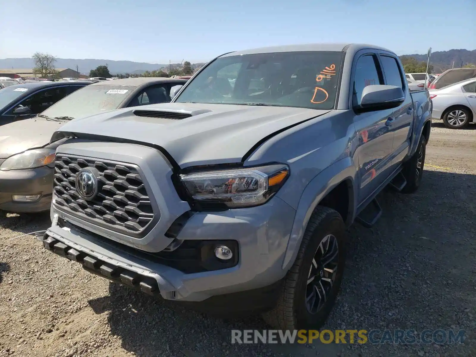 2 Photograph of a damaged car 3TMCZ5AN8LM311784 TOYOTA TACOMA 2020