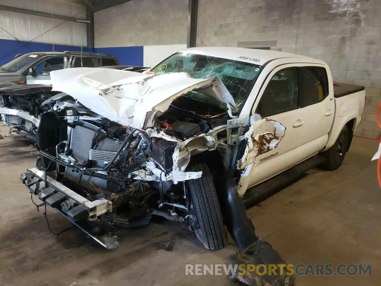 2 Photograph of a damaged car 3TMCZ5AN8LM332389 TOYOTA TACOMA 2020