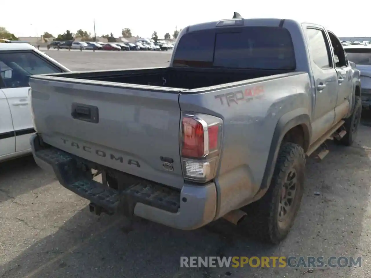 4 Photograph of a damaged car 3TMCZ5AN9LM299810 TOYOTA TACOMA 2020