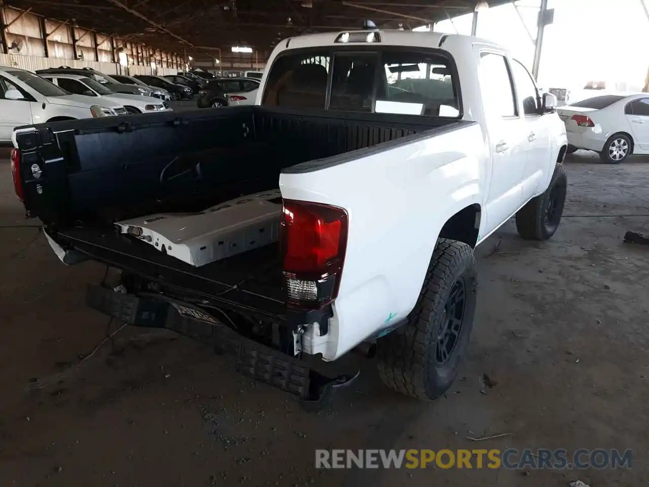 4 Photograph of a damaged car 3TMCZ5AN9LM304603 TOYOTA TACOMA 2020