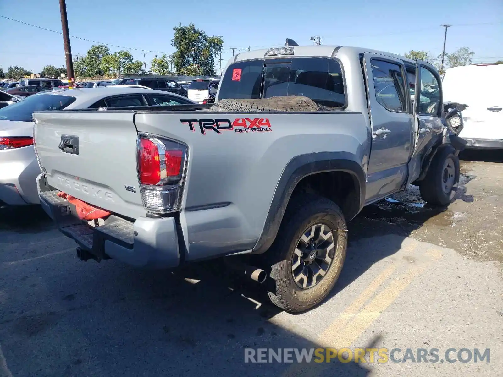 4 Photograph of a damaged car 3TMCZ5AN9LM318890 TOYOTA TACOMA 2020