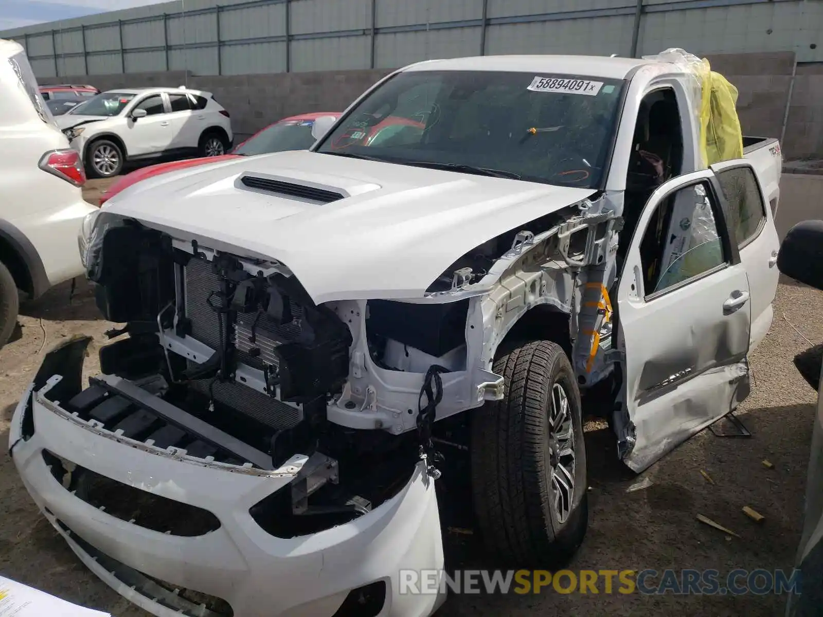 2 Photograph of a damaged car 3TMCZ5AN9LM324947 TOYOTA TACOMA 2020