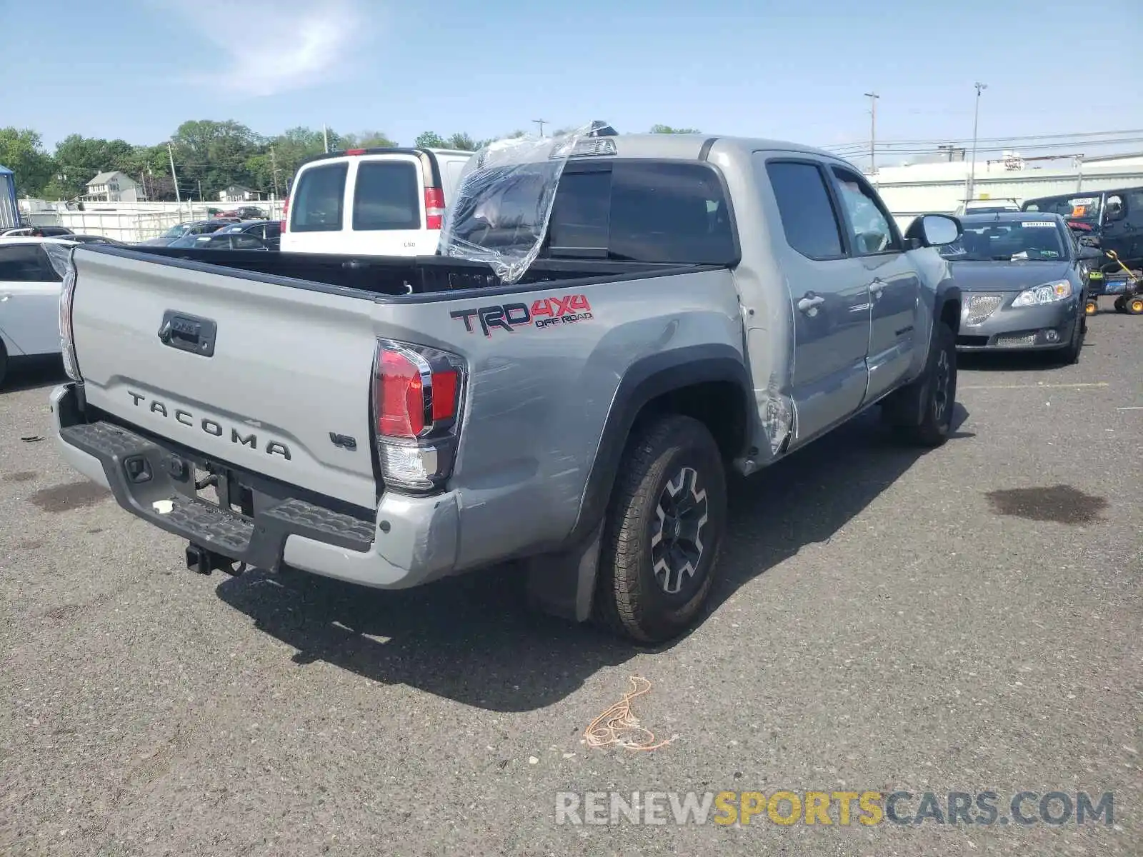 4 Photograph of a damaged car 3TMCZ5ANXLM293871 TOYOTA TACOMA 2020