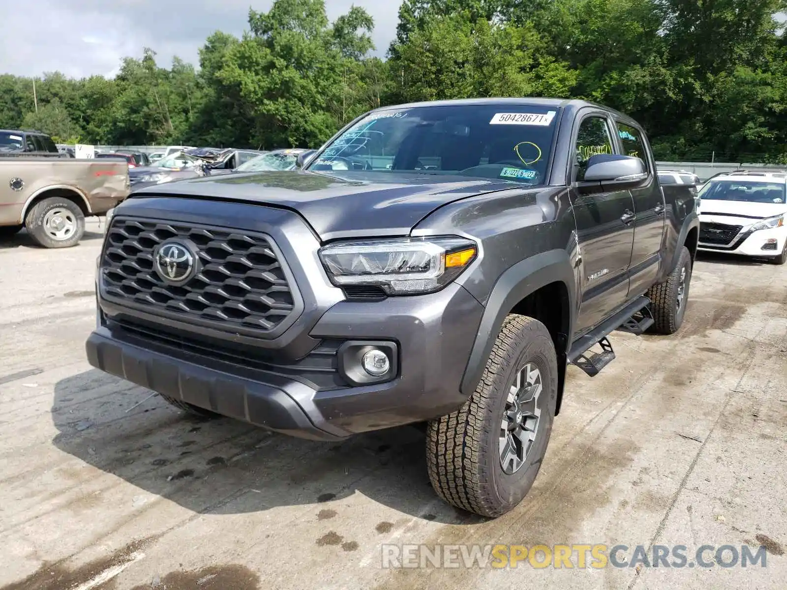 2 Photograph of a damaged car 3TMDZ5BN0LM086974 TOYOTA TACOMA 2020