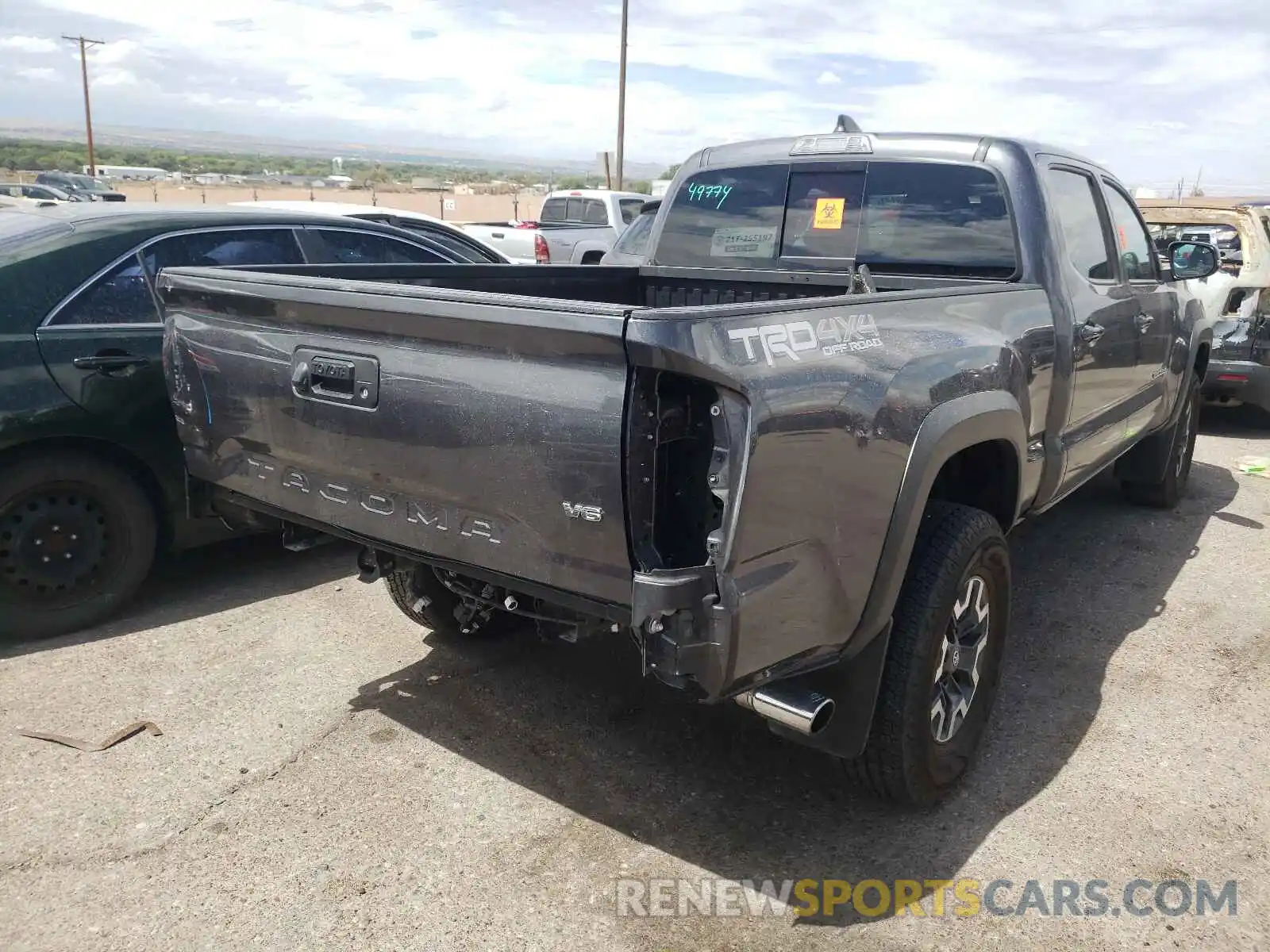 4 Photograph of a damaged car 3TMDZ5BN0LM090359 TOYOTA TACOMA 2020