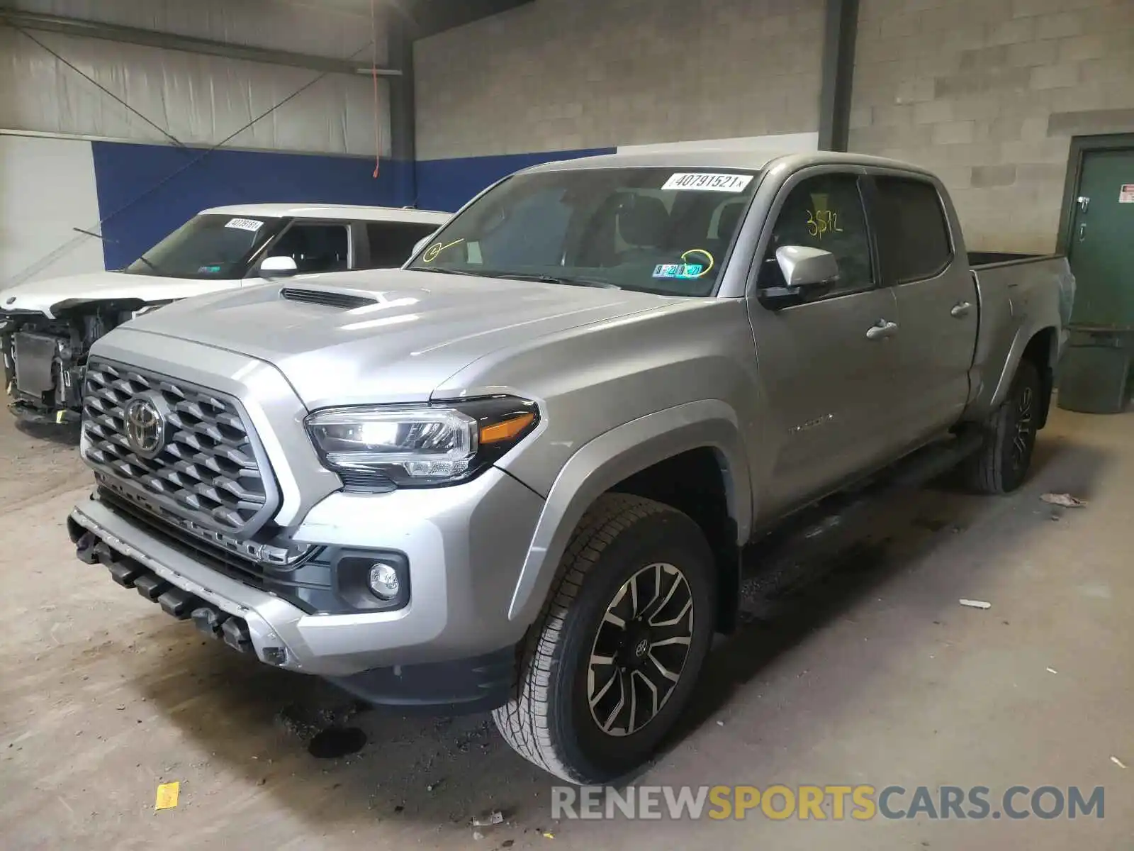 2 Photograph of a damaged car 3TMDZ5BN0LM096310 TOYOTA TACOMA 2020