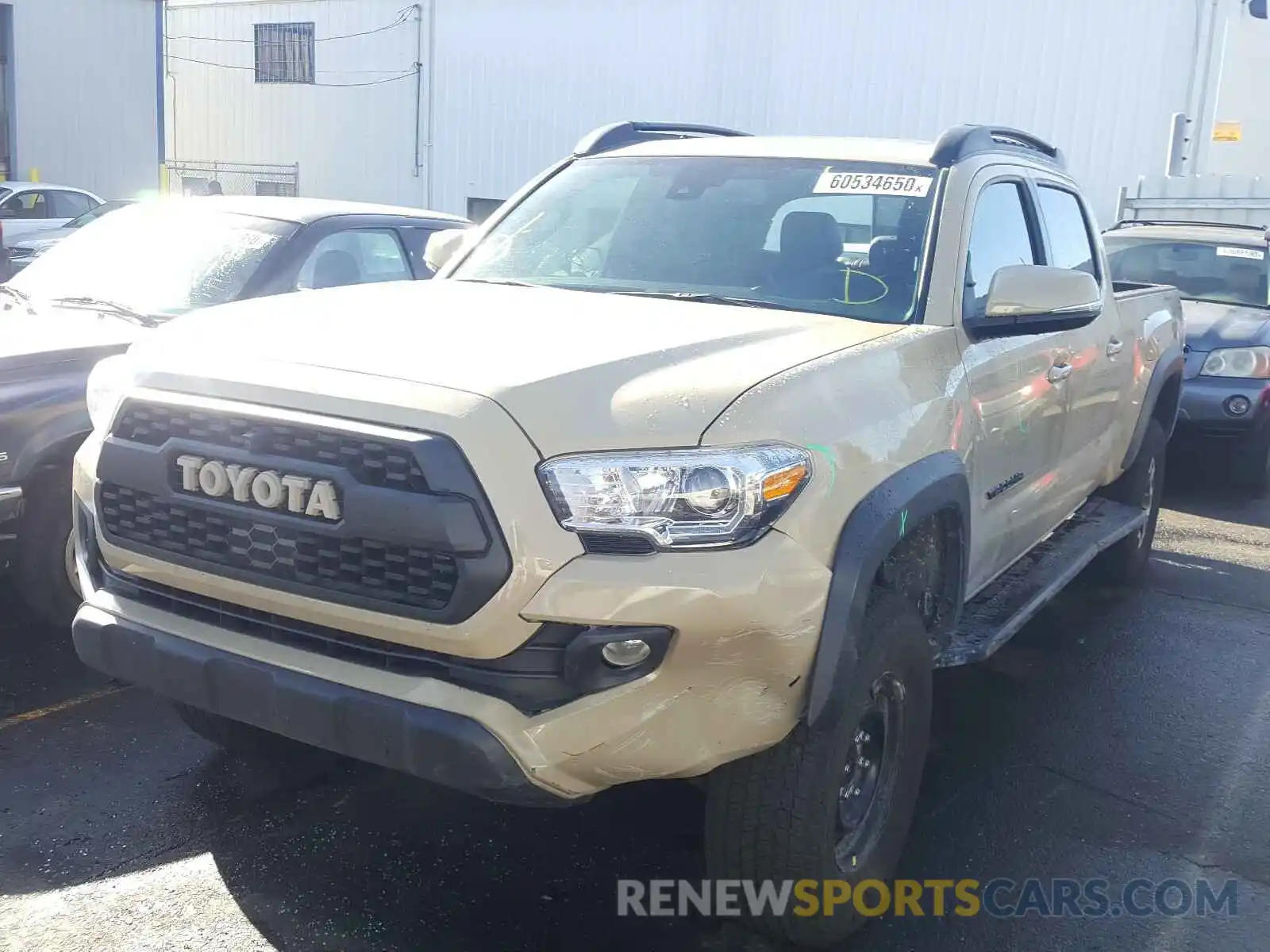 2 Photograph of a damaged car 3TMDZ5BN1LM083257 TOYOTA TACOMA 2020