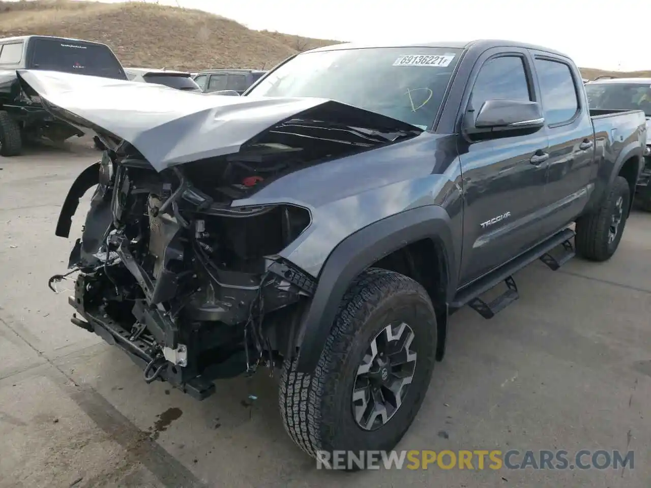 2 Photograph of a damaged car 3TMDZ5BN1LM096364 TOYOTA TACOMA 2020