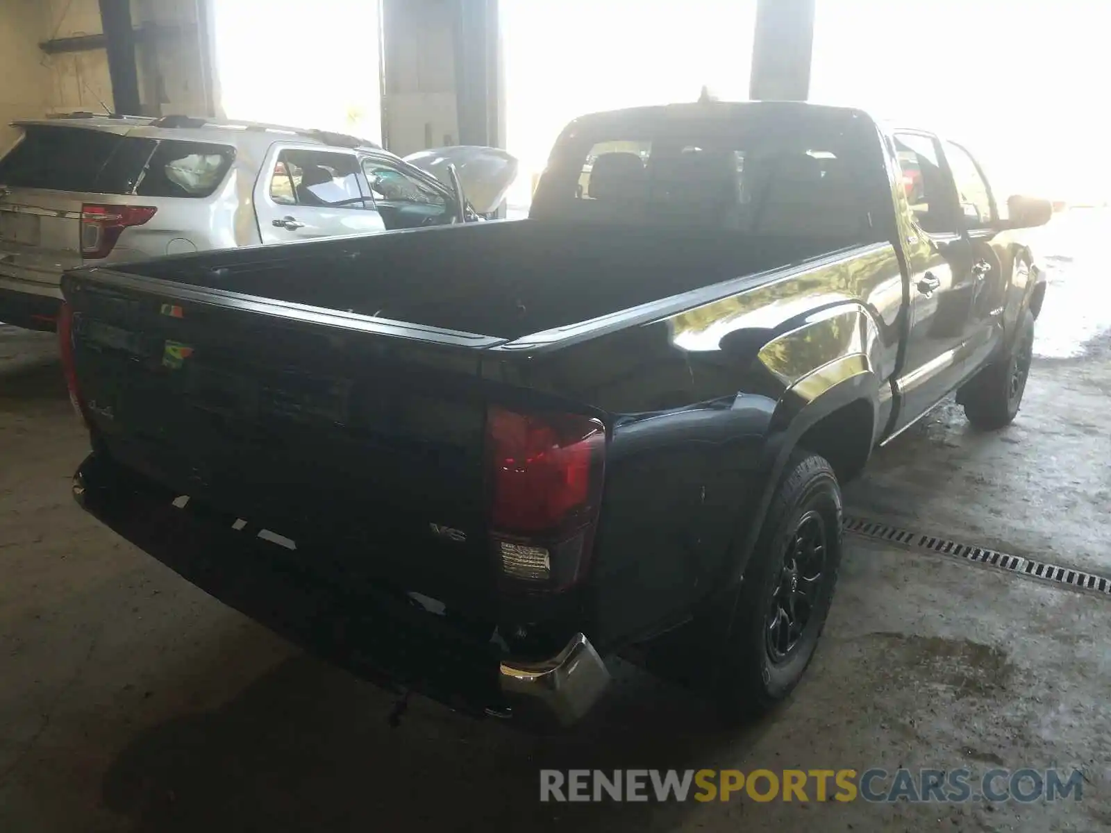 4 Photograph of a damaged car 3TMDZ5BN2LM097362 TOYOTA TACOMA 2020