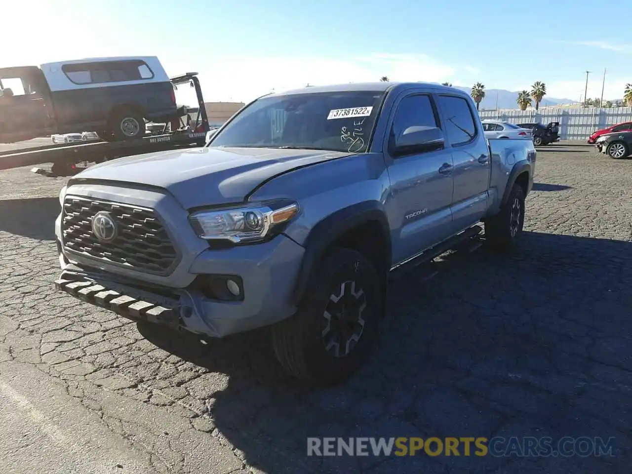 2 Photograph of a damaged car 3TMDZ5BN5LM080765 TOYOTA TACOMA 2020