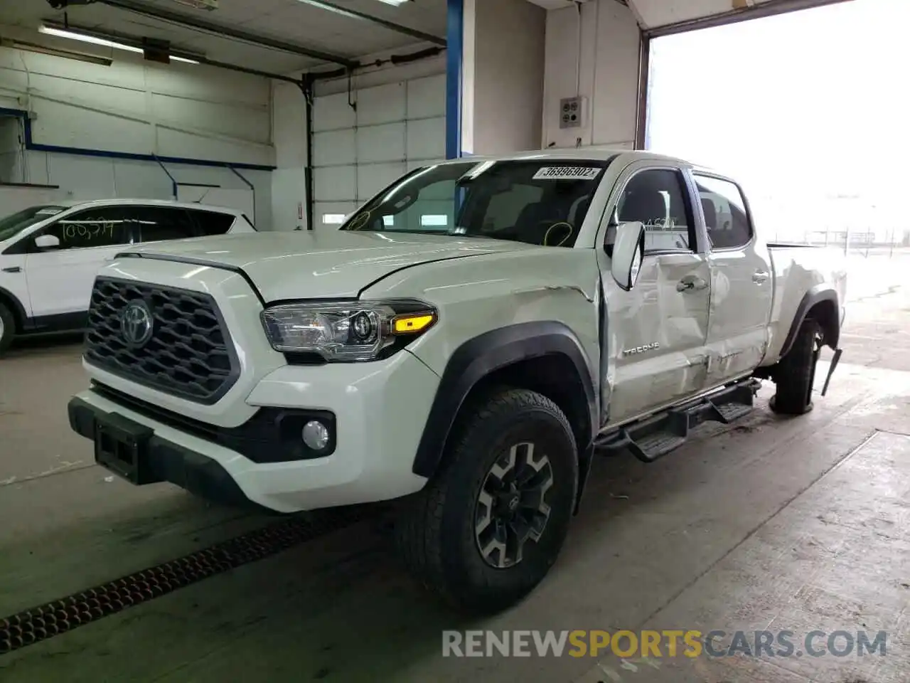 2 Photograph of a damaged car 3TMDZ5BN6LM094738 TOYOTA TACOMA 2020