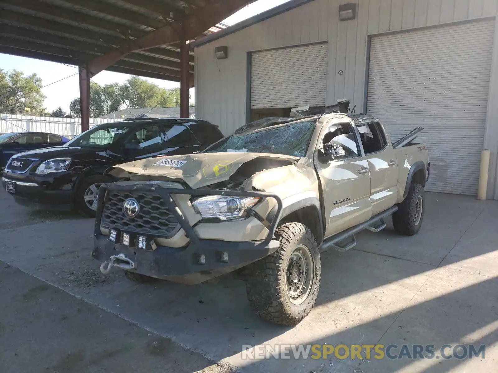 2 Photograph of a damaged car 3TMDZ5BN8LM083739 TOYOTA TACOMA 2020