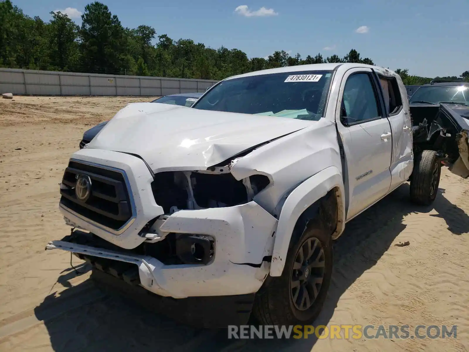 2 Photograph of a damaged car 3TMDZ5BN9LM090697 TOYOTA TACOMA 2020