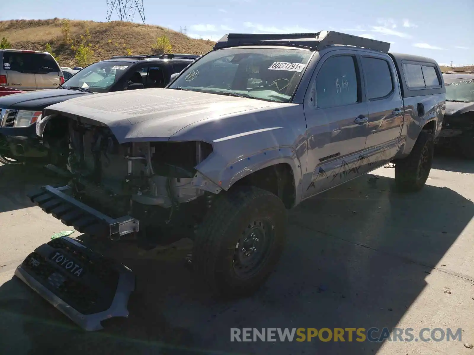 2 Photograph of a damaged car 3TMDZ5BN9LM094667 TOYOTA TACOMA 2020