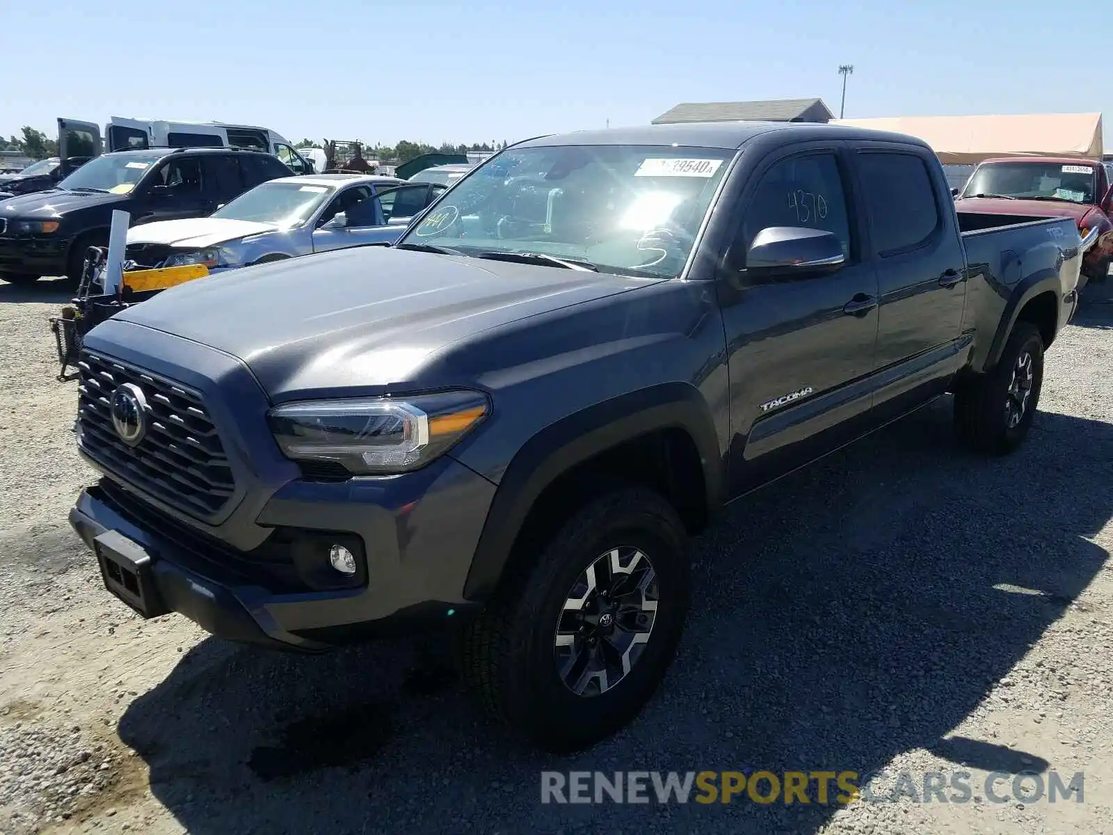 2 Photograph of a damaged car 3TMDZ5BNXLM081796 TOYOTA TACOMA 2020