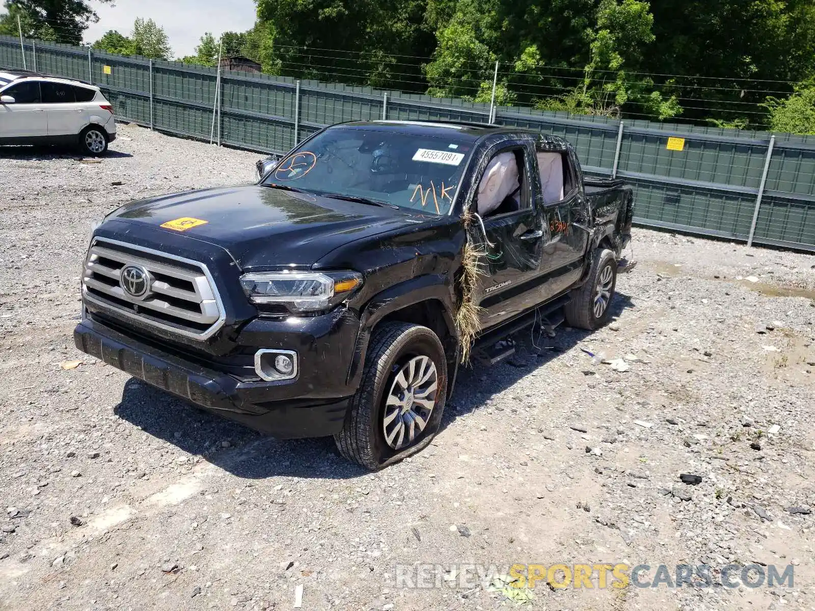 2 Photograph of a damaged car 3TMGZ5AN4LM335484 TOYOTA TACOMA 2020