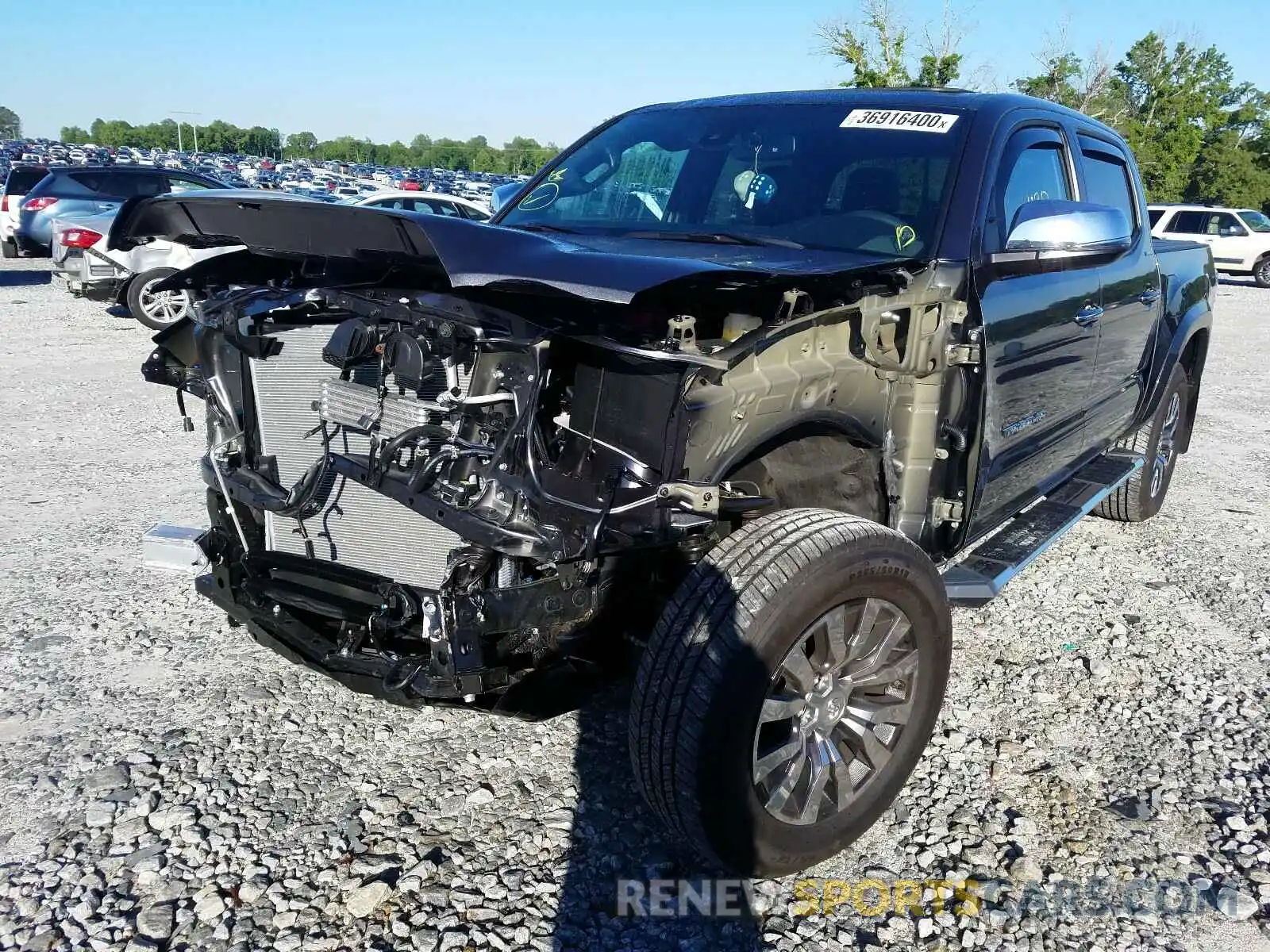 2 Photograph of a damaged car 3TMGZ5AN6LM333445 TOYOTA TACOMA 2020