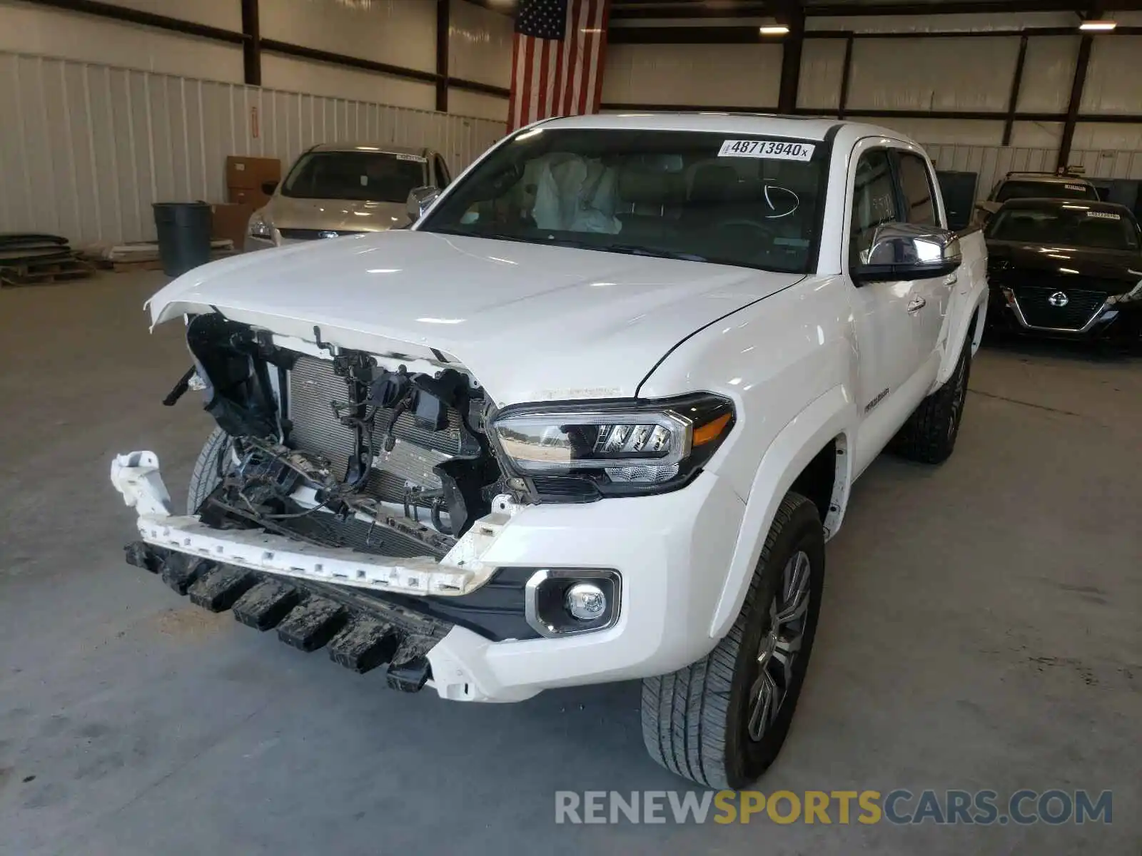 2 Photograph of a damaged car 3TMGZ5AN6LM337236 TOYOTA TACOMA 2020