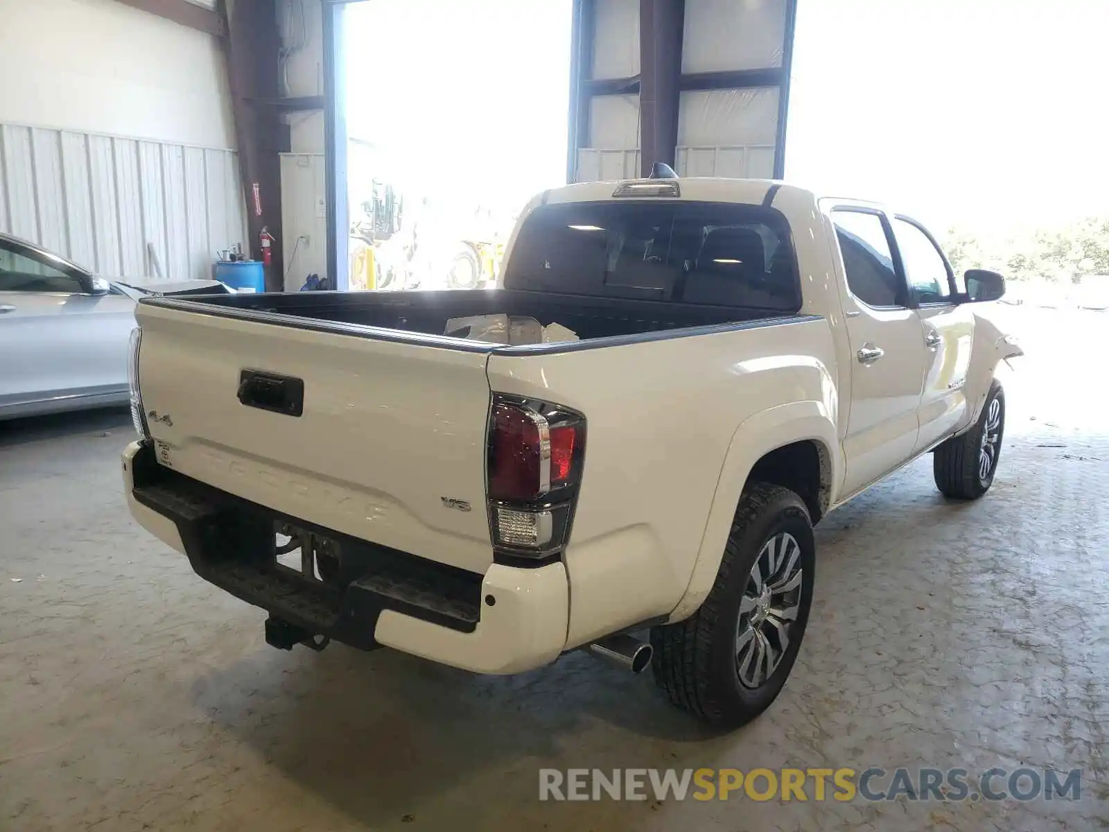 4 Photograph of a damaged car 3TMGZ5AN6LM337236 TOYOTA TACOMA 2020