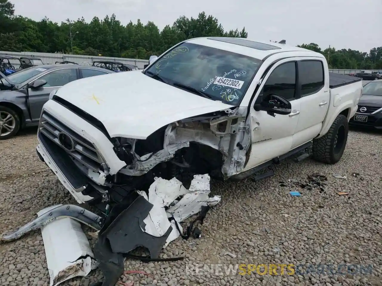 2 Photograph of a damaged car 3TMGZ5AN8LM346715 TOYOTA TACOMA 2020