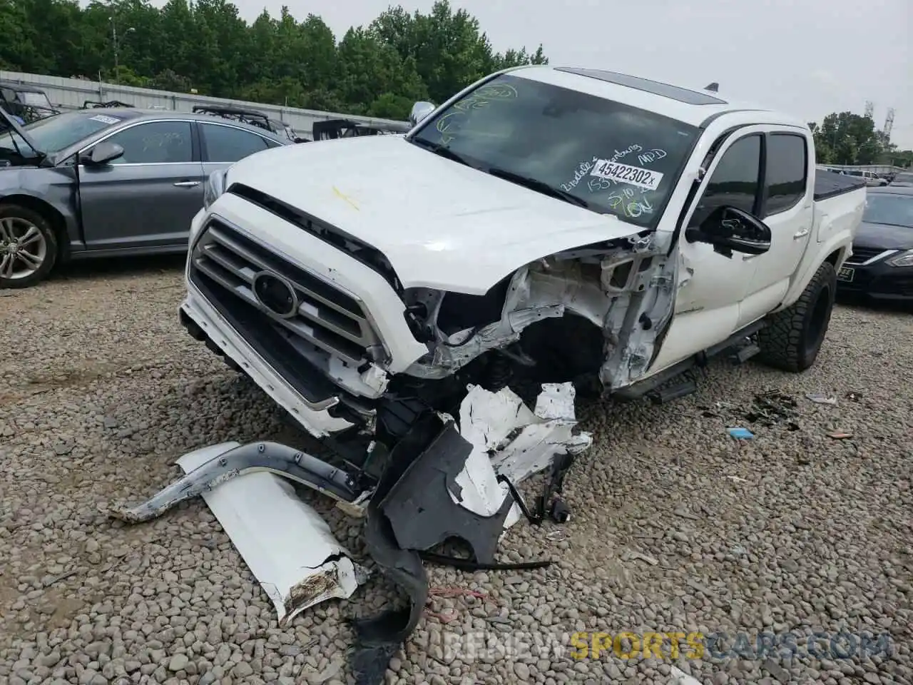 9 Photograph of a damaged car 3TMGZ5AN8LM346715 TOYOTA TACOMA 2020