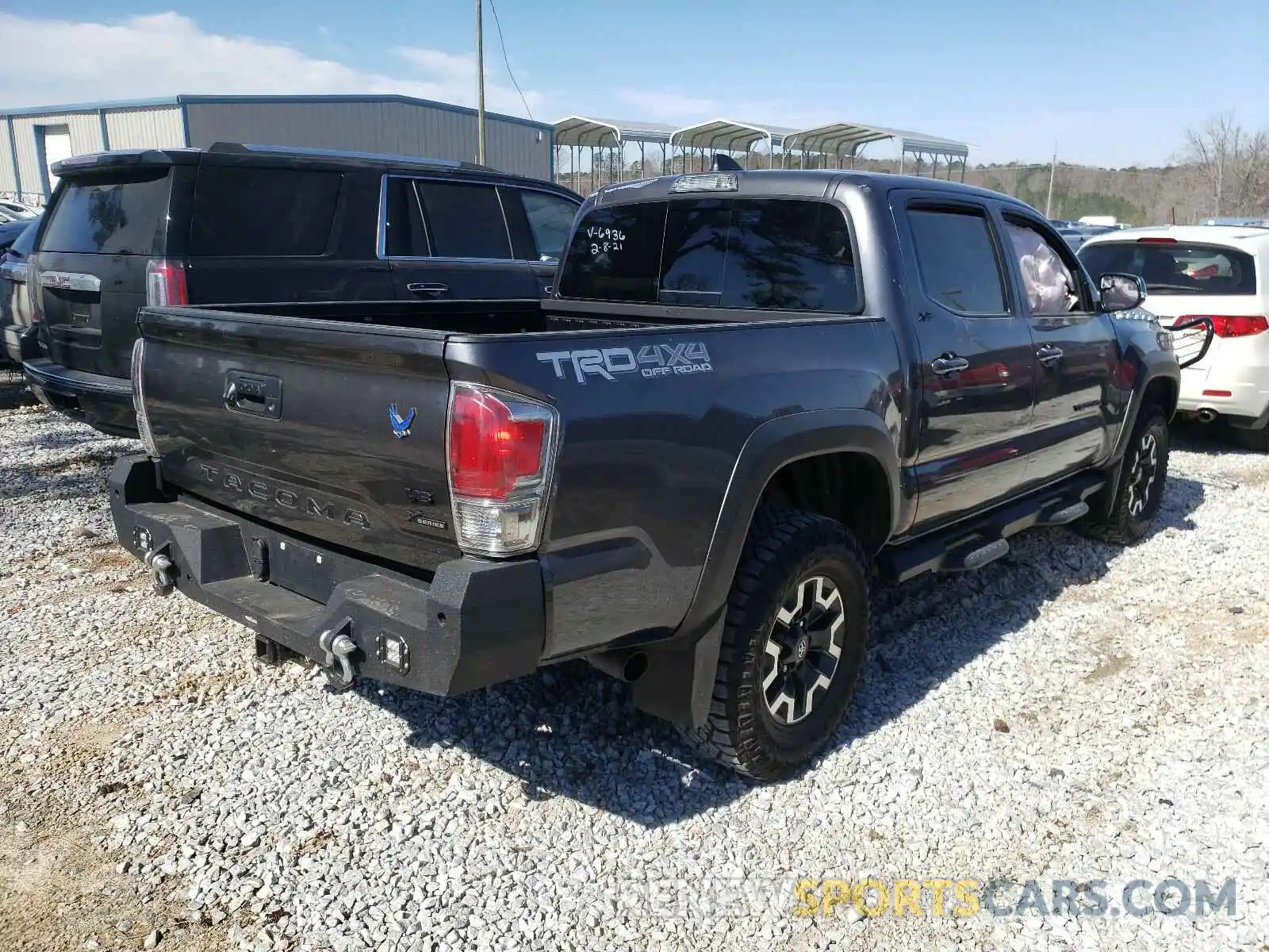 4 Photograph of a damaged car 3TYCZ5AN8LT006936 TOYOTA TACOMA 2020