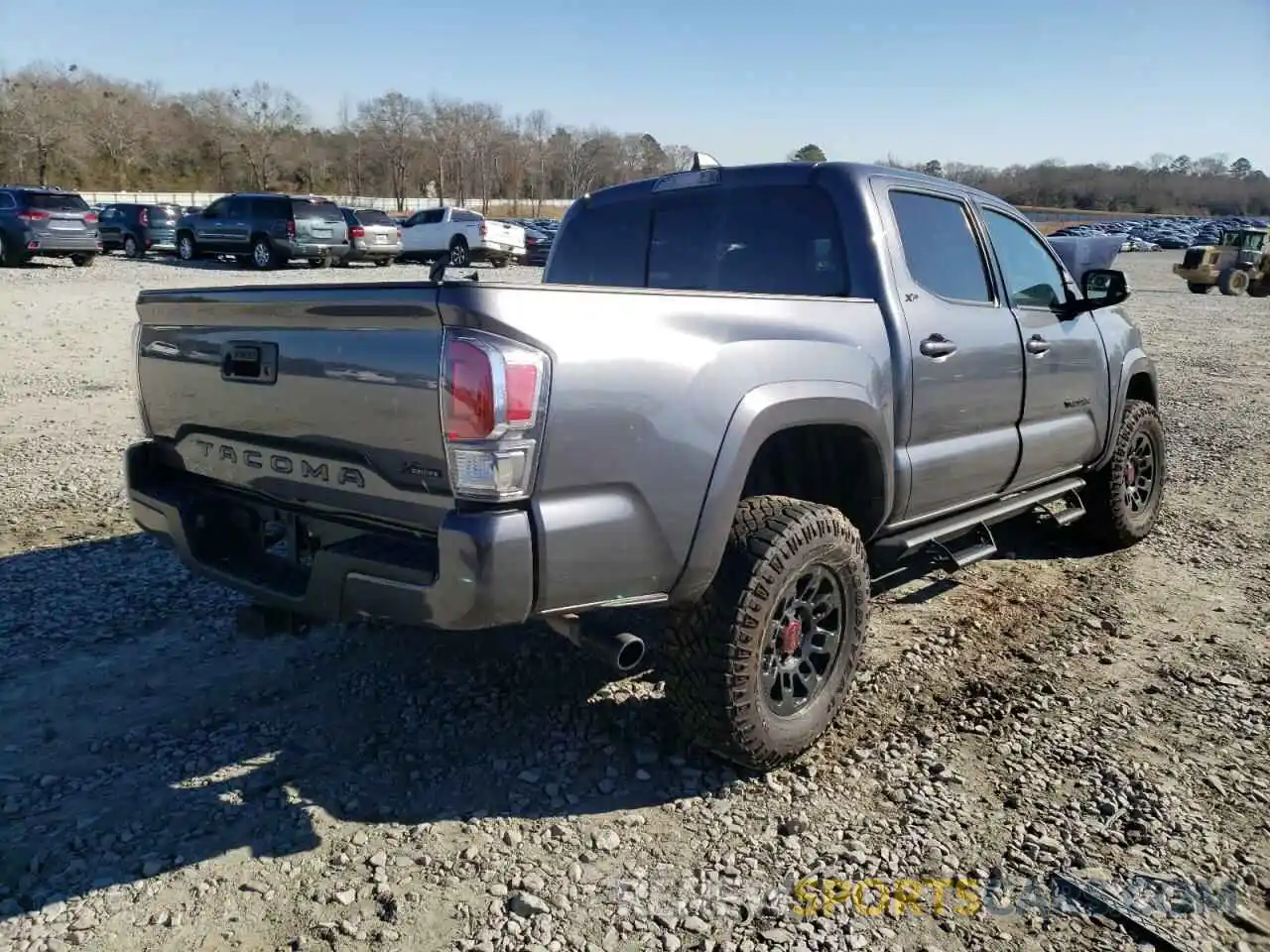 4 Photograph of a damaged car 3TYCZ5ANXLT003424 TOYOTA TACOMA 2020