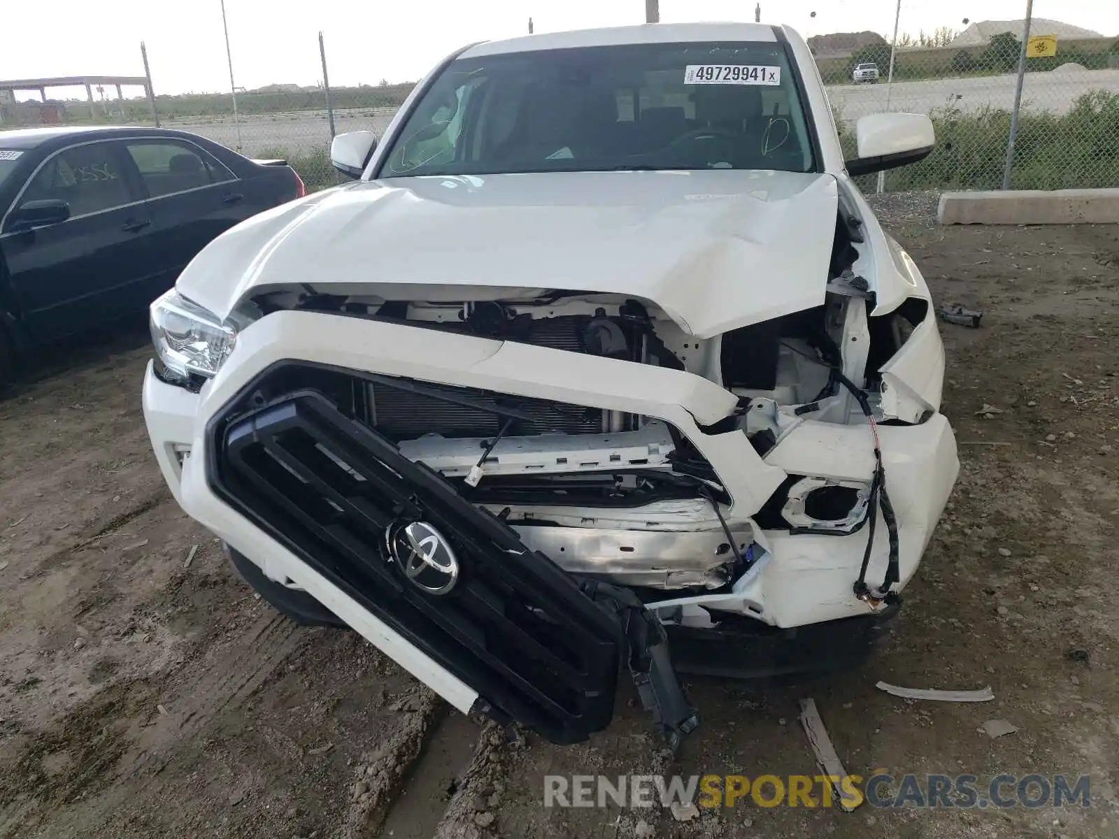 9 Photograph of a damaged car 5TFAX5GN3LX186529 TOYOTA TACOMA 2020