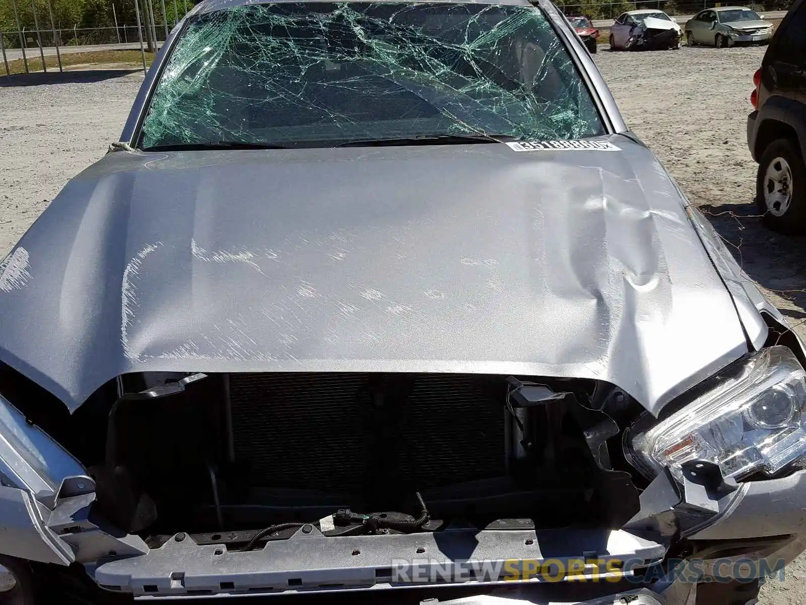 7 Photograph of a damaged car 5TFAX5GN4LX172994 TOYOTA TACOMA 2020