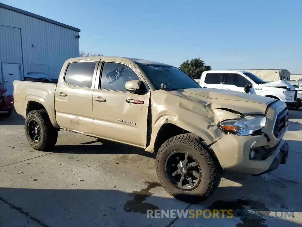 4 Photograph of a damaged car 5TFAX5GN9LX166740 TOYOTA TACOMA 2020