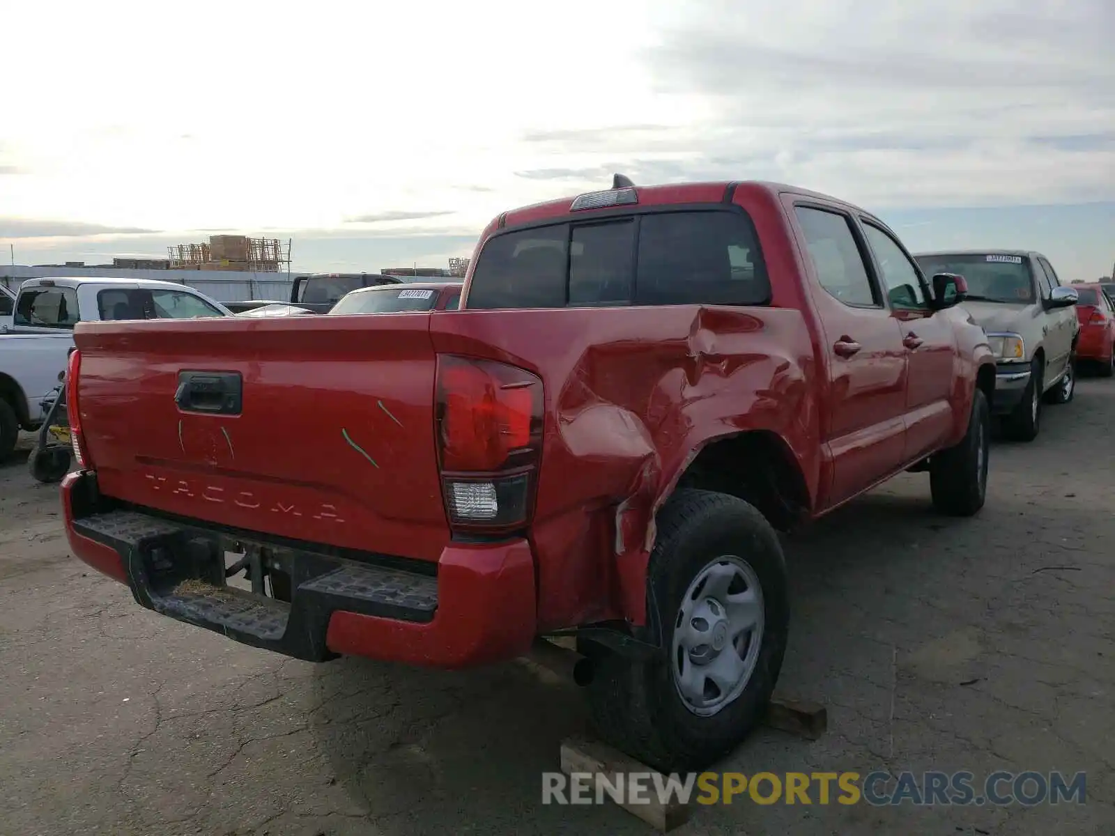 4 Photograph of a damaged car 5TFAX5GN9LX169914 TOYOTA TACOMA 2020