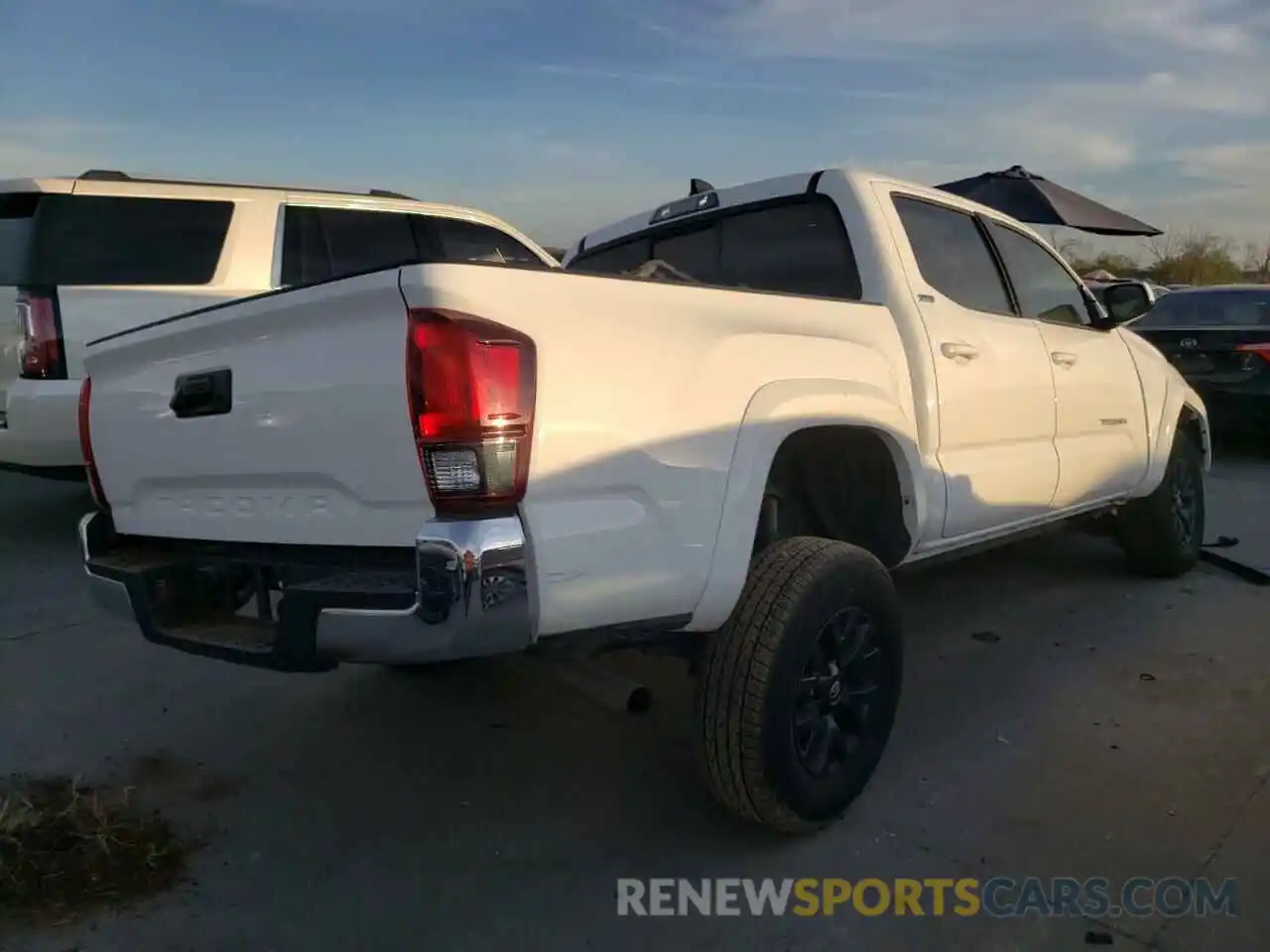 4 Photograph of a damaged car 5TFAX5GN9LX180783 TOYOTA TACOMA 2020