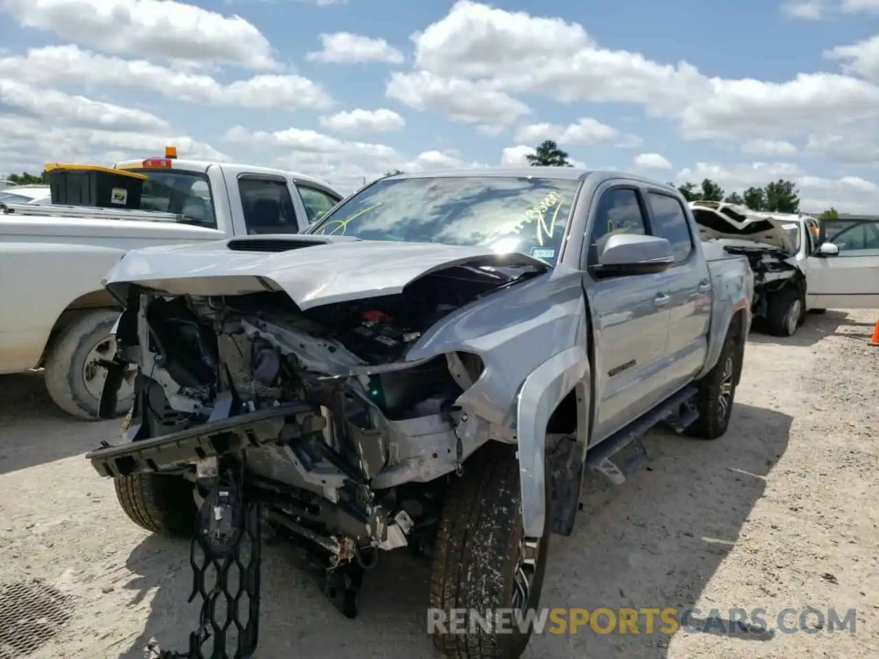 2 Photograph of a damaged car 5TFAZ5CN0LX093631 TOYOTA TACOMA 2020