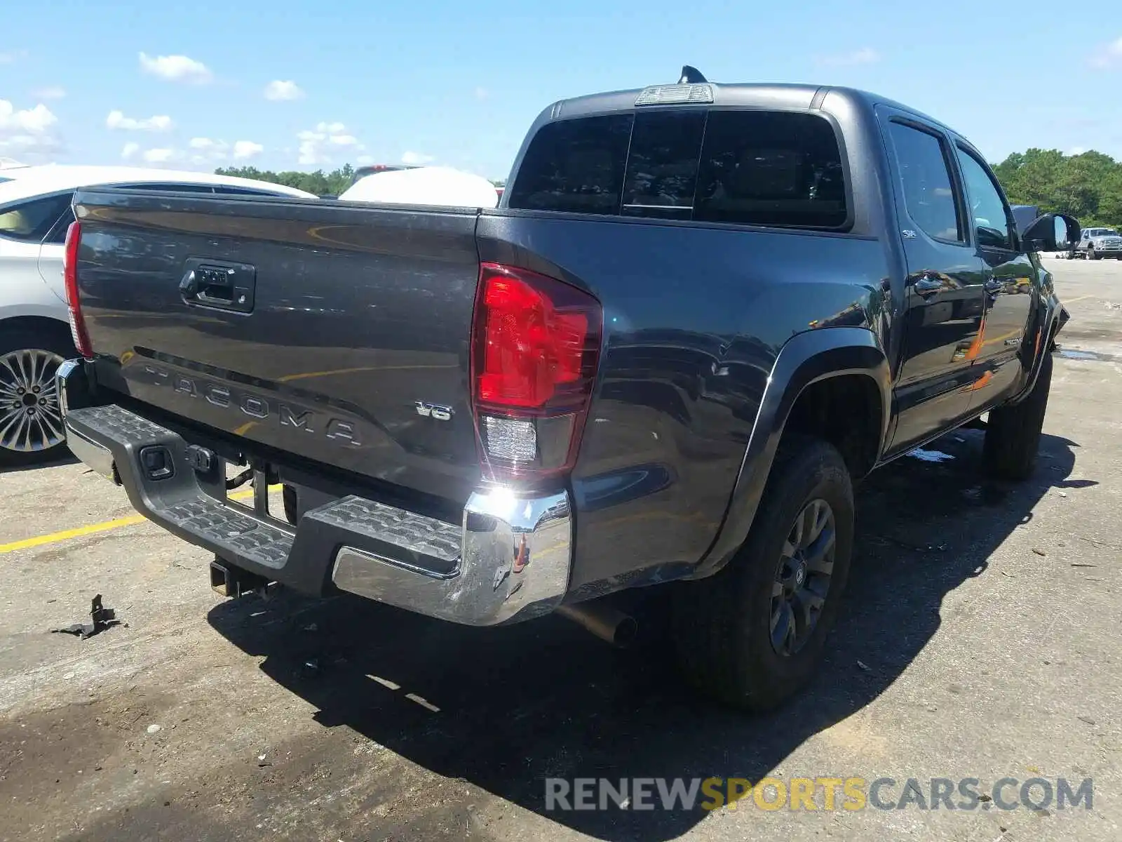 4 Photograph of a damaged car 5TFAZ5CN3LX093011 TOYOTA TACOMA 2020