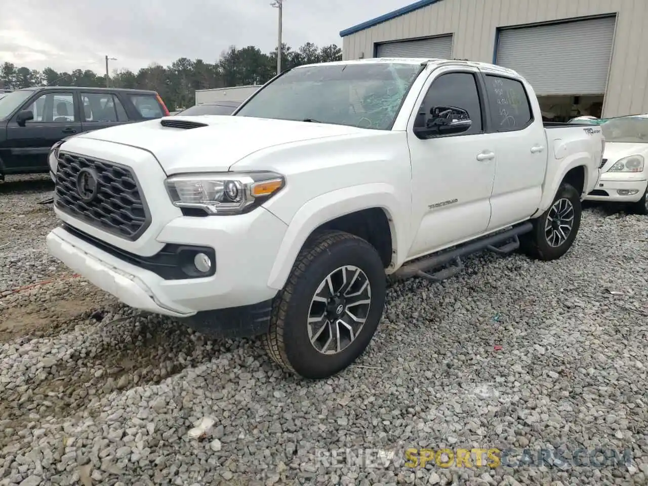 2 Photograph of a damaged car 5TFAZ5CN4LX090957 TOYOTA TACOMA 2020