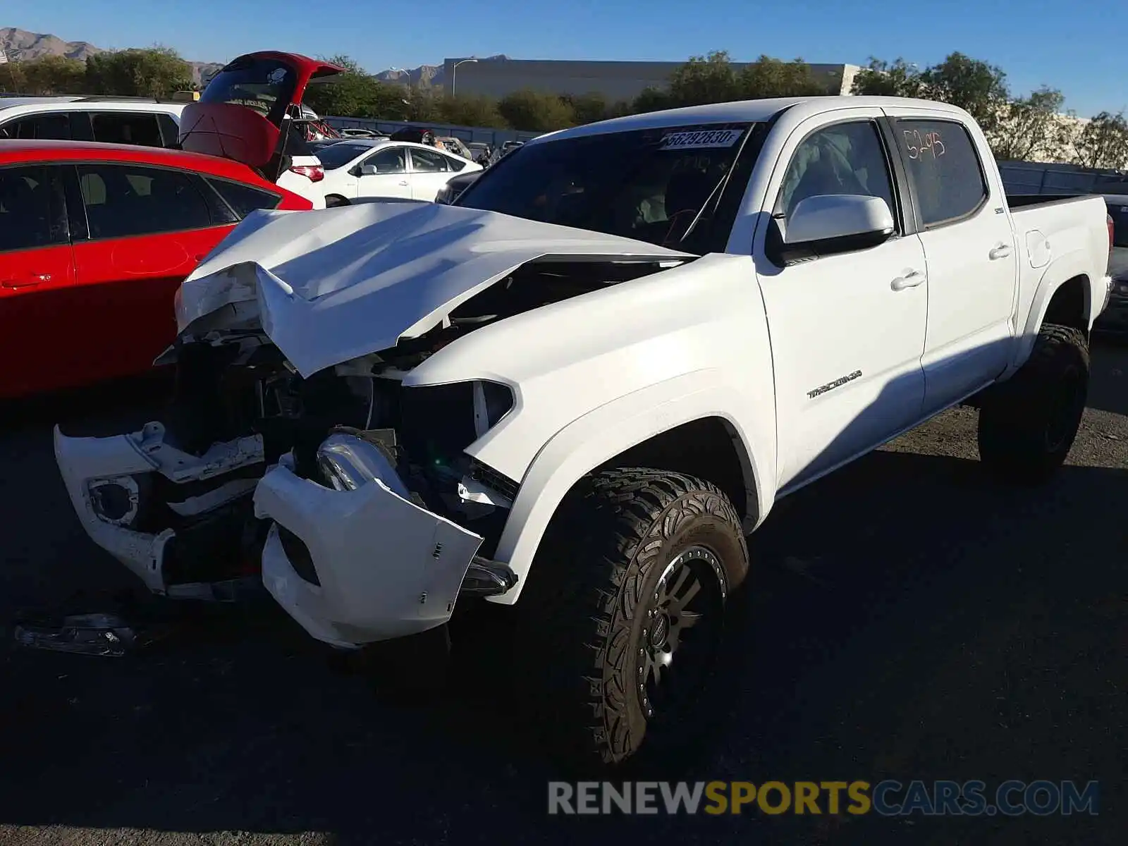 2 Photograph of a damaged car 5TFAZ5CN4LX092868 TOYOTA TACOMA 2020