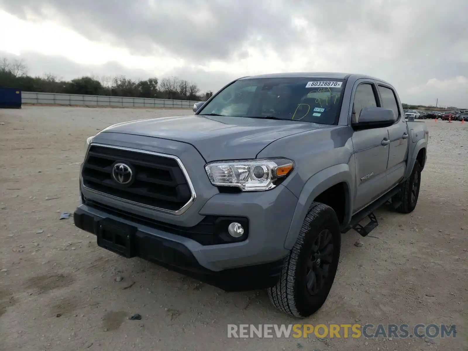 2 Photograph of a damaged car 5TFAZ5CN5LX089977 TOYOTA TACOMA 2020