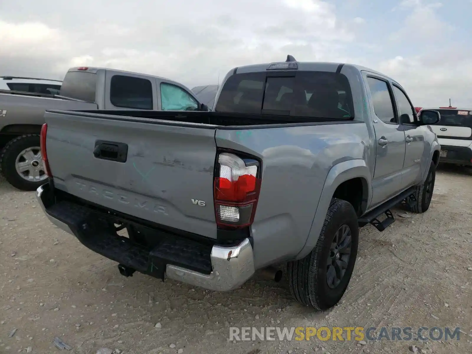 4 Photograph of a damaged car 5TFAZ5CN5LX089977 TOYOTA TACOMA 2020