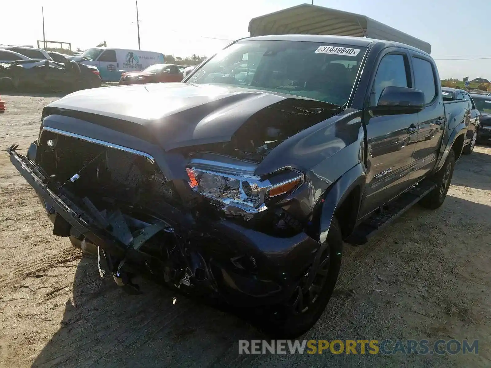 2 Photograph of a damaged car 5TFAZ5CN5LX090286 TOYOTA TACOMA 2020