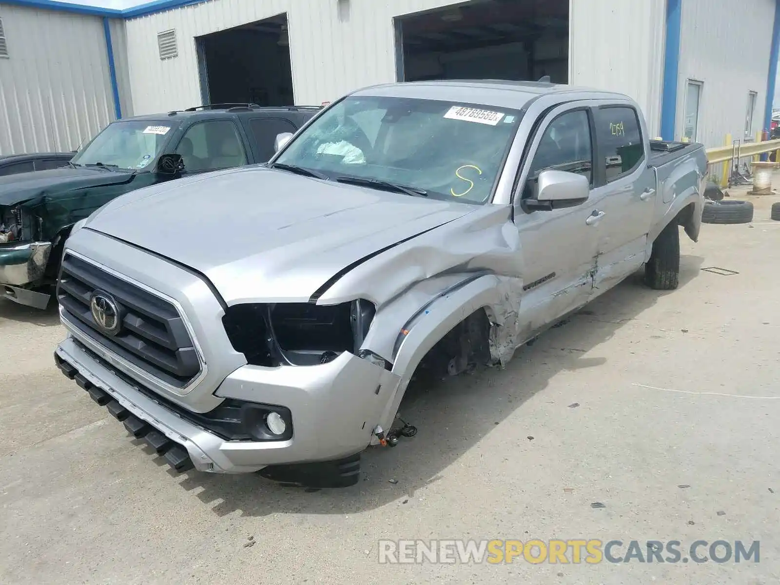 2 Photograph of a damaged car 5TFAZ5CN6LX093651 TOYOTA TACOMA 2020